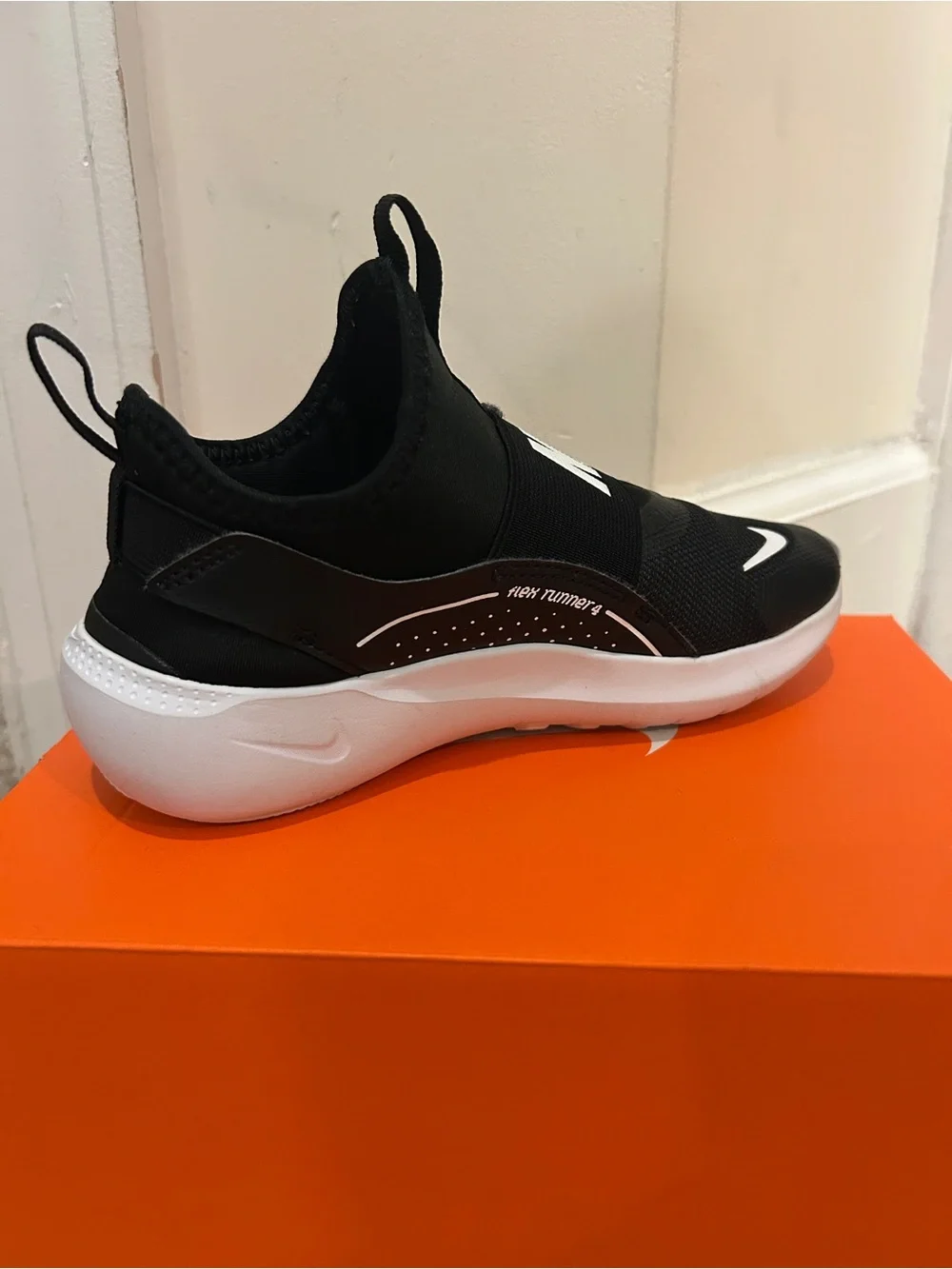 Kids Nike Black and White Slip-Ons